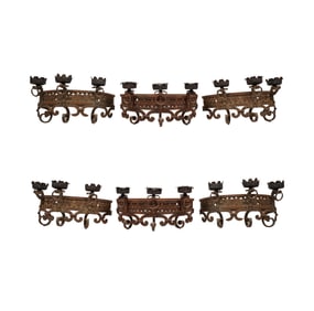 A Set of Six Wrought Iron Wall Lights