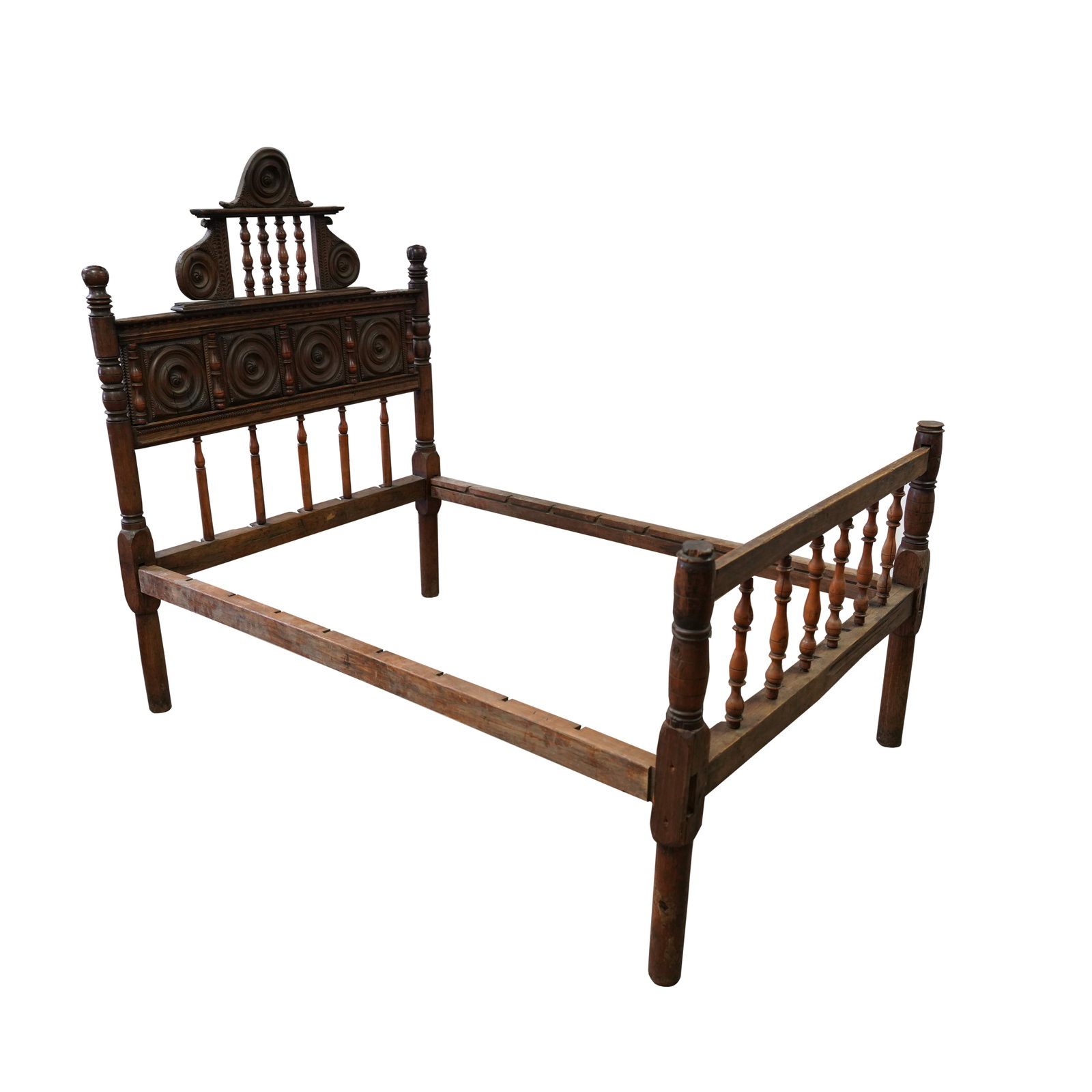 A Spanish Baroque-Style Bed: 19th century; of mixed woods 64 x 51 x 77 in. (162.6 x 129.5 x 195.6 cm.), Interior: 19 x 45 1/2 x 72 1/2 in. (48.3 x 115.6 x 184.2 cm.) Provenance: Property from the Estate of Francis and Marion Lede