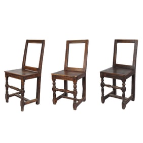 An Assembled Set of Three Spanish-Style Chairs