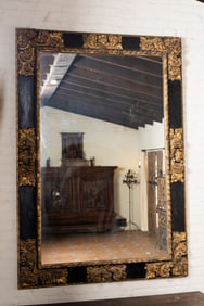 A Spanish Baroque-Style Parcel Gilt and Ebonized Wall Mirror