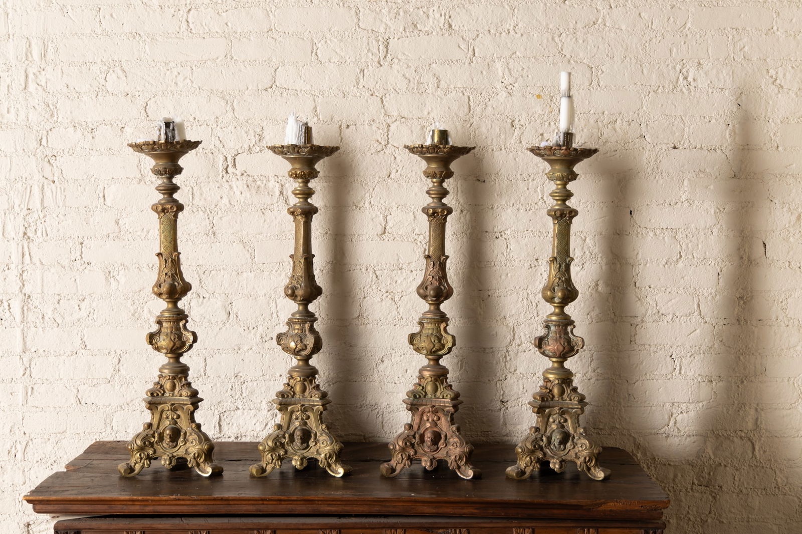 A Set of Four Continental Baroque-Style Cast Brass Altar Sticks (1 of 18)