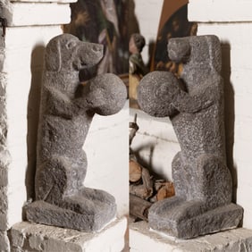 A Pair of Continental Carved Stone Dog Figures