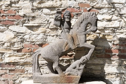 A Continental Carved Stone Figure of a Horseman