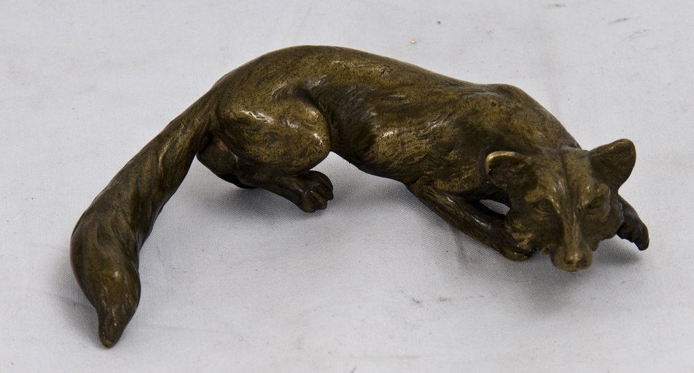 TIFFANY STUDIOS BRONZE PAPERWEIGHT OF A FOX: numbered 894 below 3 1/2 inches long