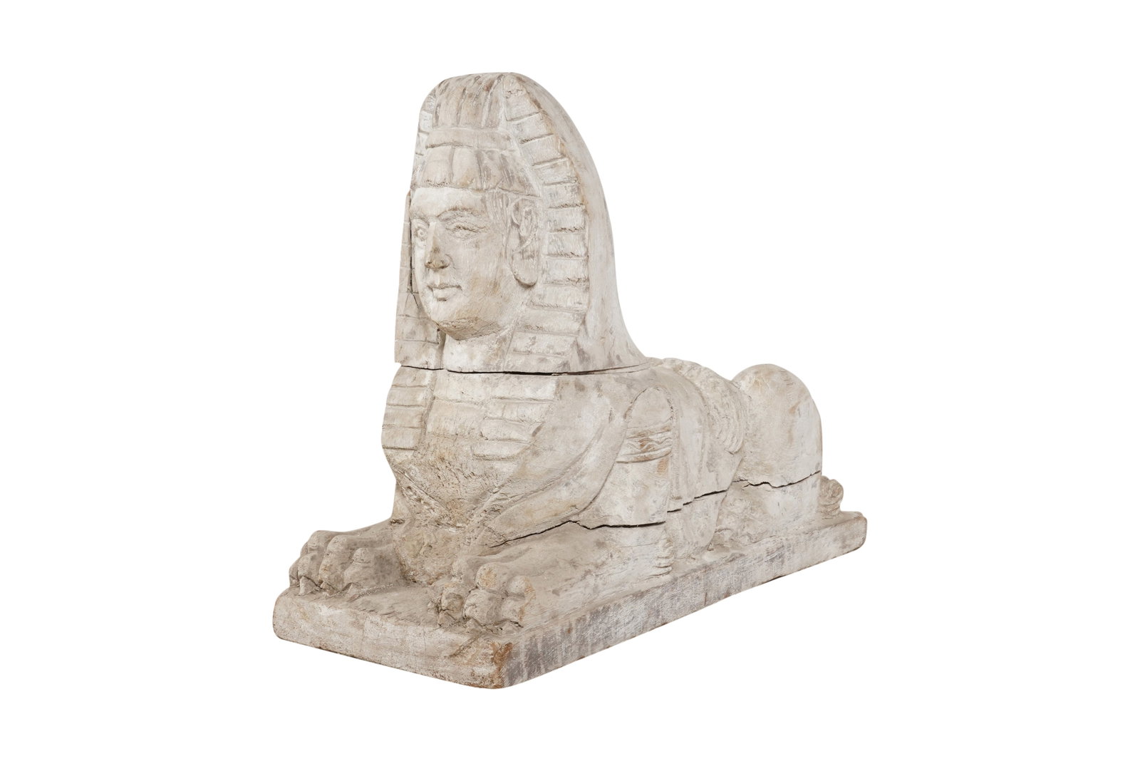 A Carved Sphinx Figure: with whitewashed finish 21 x 28 1/2 x 11 in. (53.3 x 72.4 x 27.9 cm.)