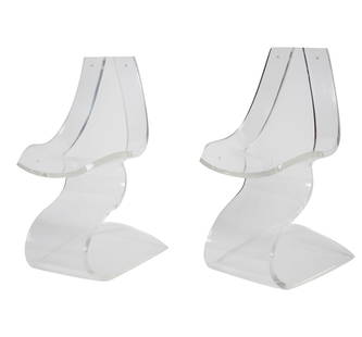 Michel Dumas for Atelier Dumas: Pair of Chairs: France; constructed from a single piece of sculpted Lucite 31 1/2 x 18 1/2 x 16 in. (80 x 47 x 40.6 cm.), Seat height: 19 in. (48.3 cm.)