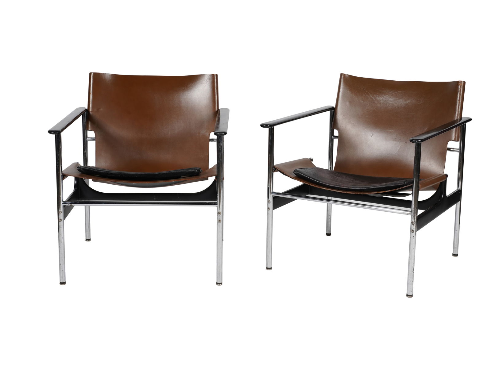 Charles Pollock for Knoll: Pair of 657 Armchairs: 1970s, designed 1960;; chromed steel, powder-coated aluminum, leather; unsigned 27 x 24 3/4 x 25 in. (68.6 x 62.9 x 63.5 cm.)