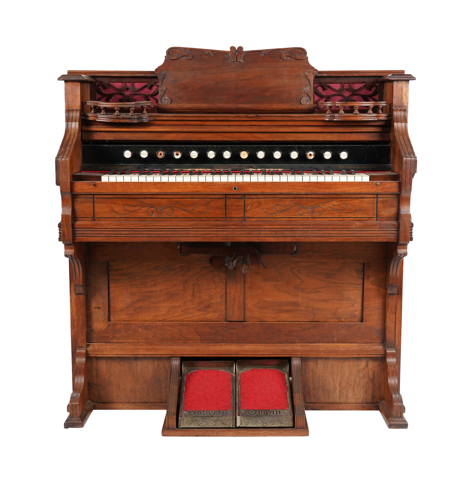 A W. Doherty and Co. Pump Organ: signed to the console and pumps 49 x 44 x 23 in. (124.5 x 111.8 x 58.4 cm.)