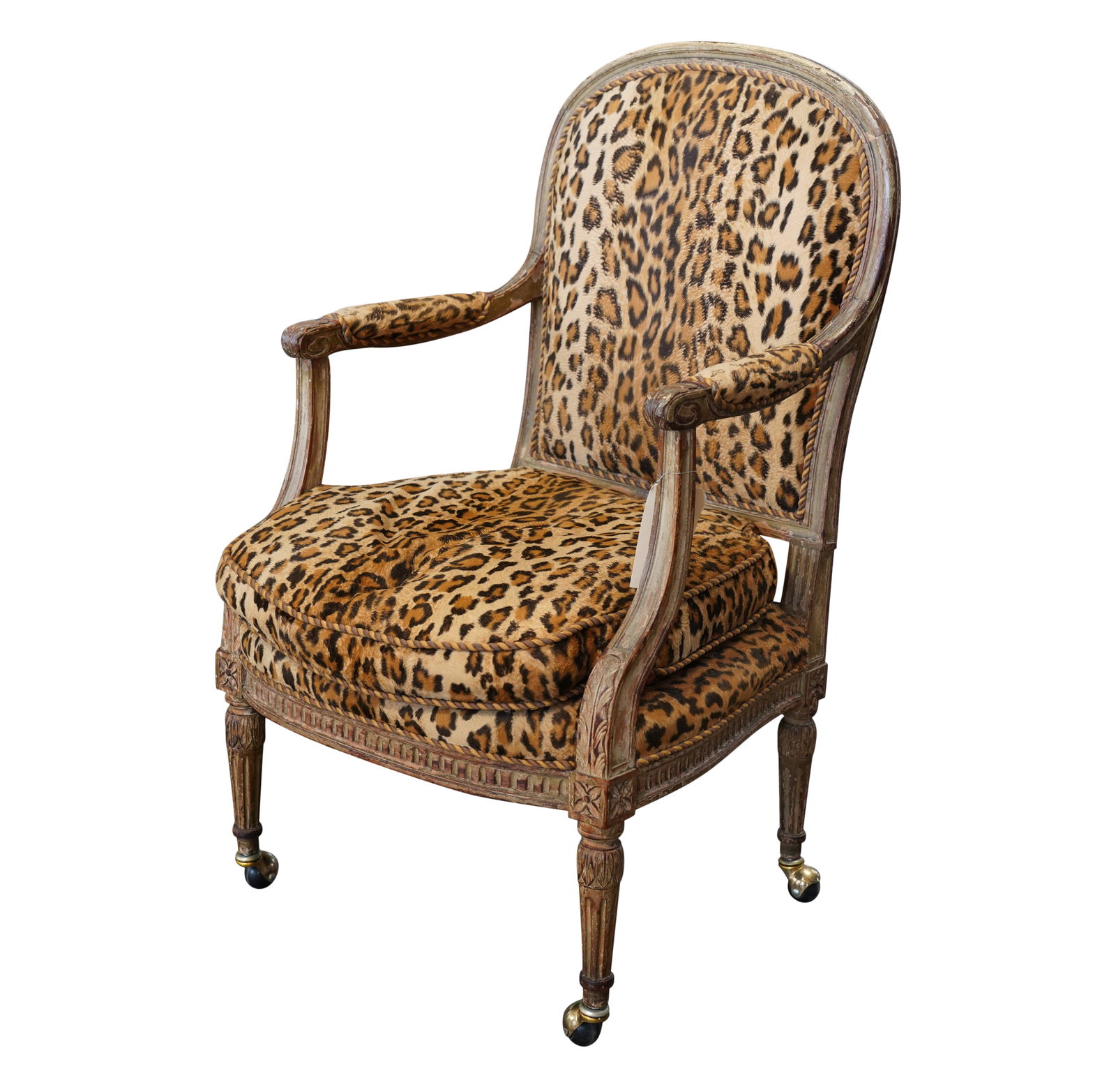 A Louis XVI-Style Fauteuil: upholstered in leopard-print fabric 41 x 23 x 22 in. (104.1 x 58.4 x 55.9 cm.), Seat height 19 in. (48.3 cm.)