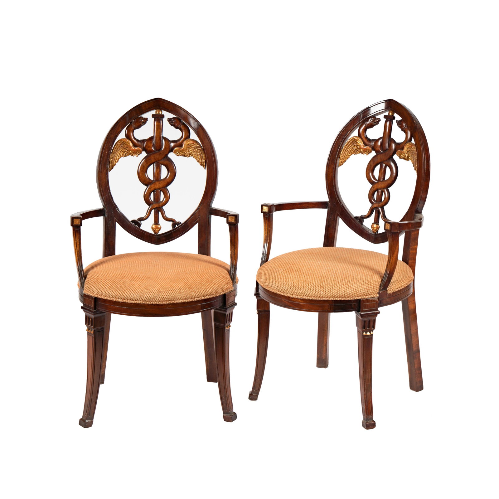 A Pair of Baltic Neoclassical Mahogany Armchairs: 19th century; each backrest carved with a caduceus 39 x 21 x 21 in. (99.1 x 53.3 x 53.3 cm.), Seat height: 19 in. (48.3 cm.) Provenance: with Rossi Antiques and Custom Furniture, San Francisco, Califo