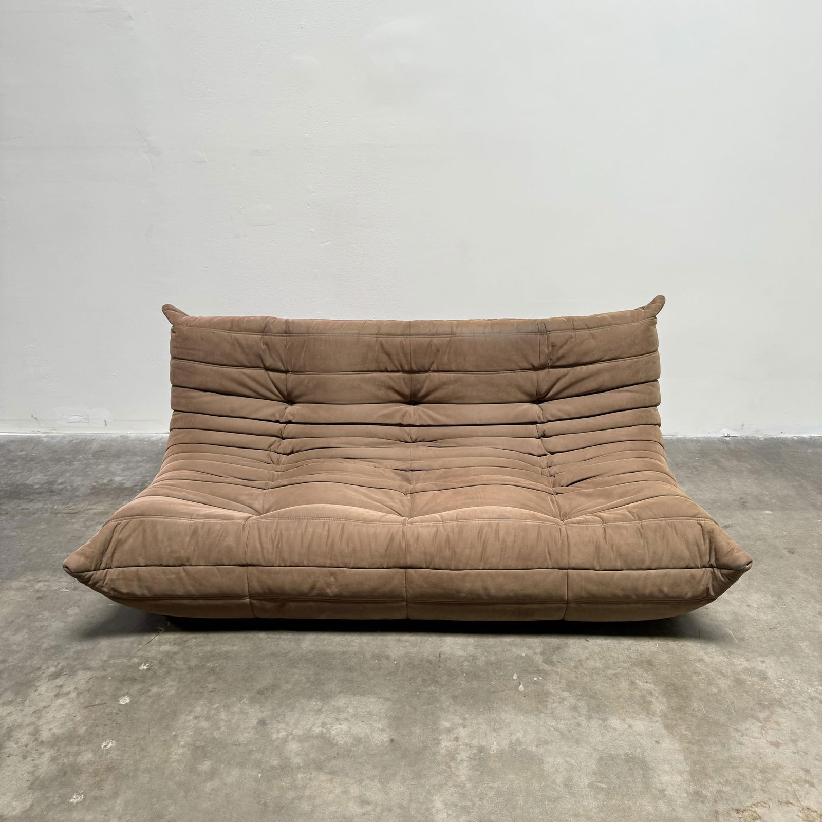 Michel Ducaroy for Ligne Roset: Three-Seat Brown Alcantara Togo Sofa: 2007 26 x 66 x 36 in. (66 x 167.6 x 91.4 cm.), Seat Height: 13 in. (33 cm.)