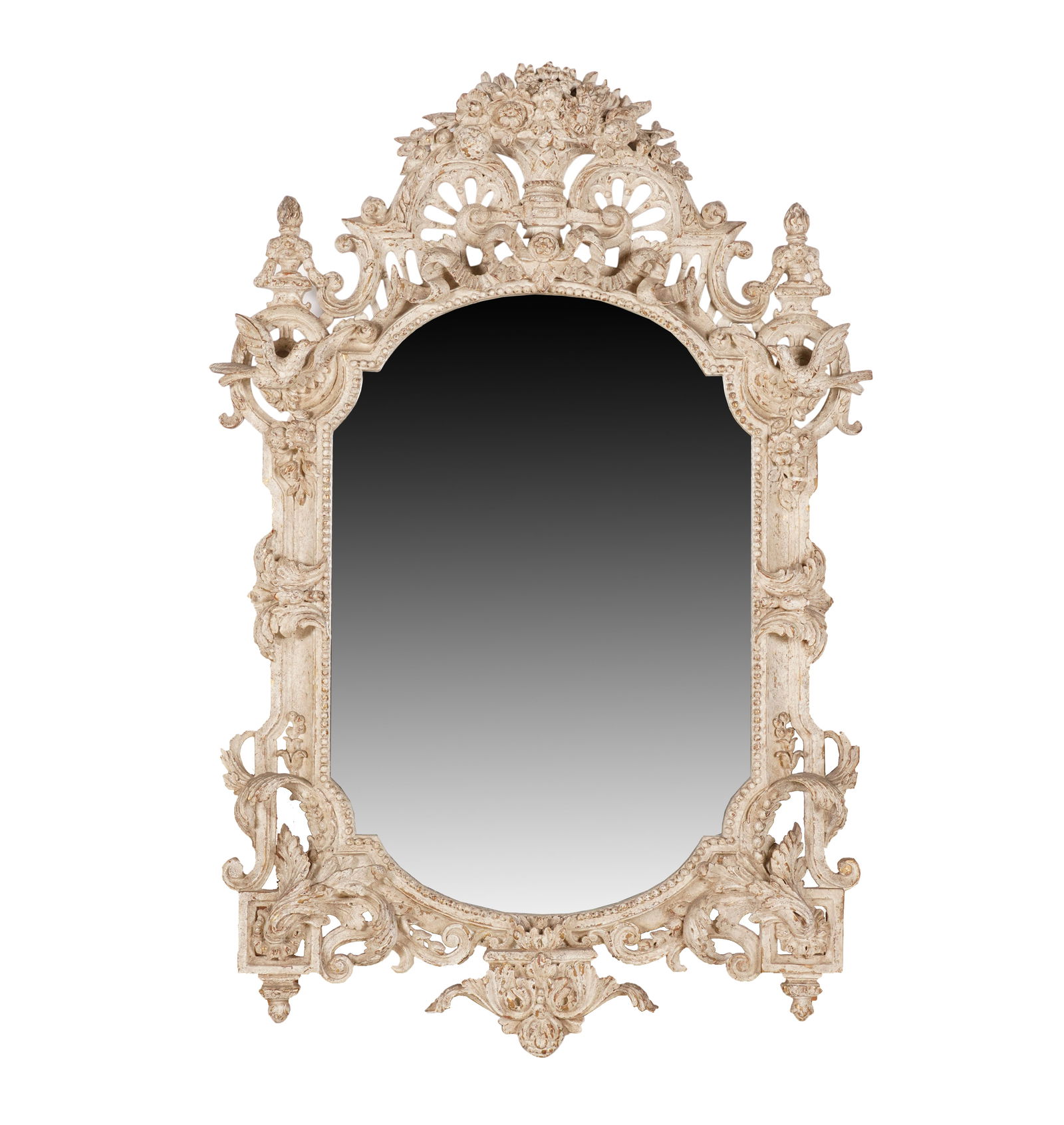 A Minton-Spidell R?gence-Style Carved Mirror: crested with a basket of flowers, over scrolls, ribbons, foliage and birds 60 x 40 in. (152.4 x 101.6 cm.)