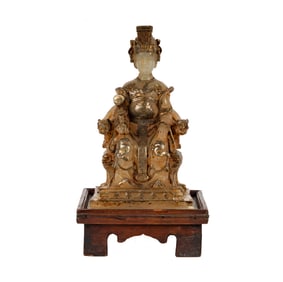 A Carved Stone Figure