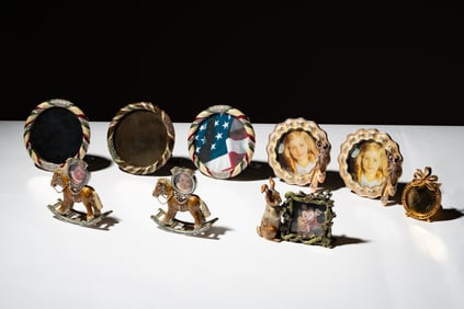 A Group of Jay Strongwater Enamel Picture Frames