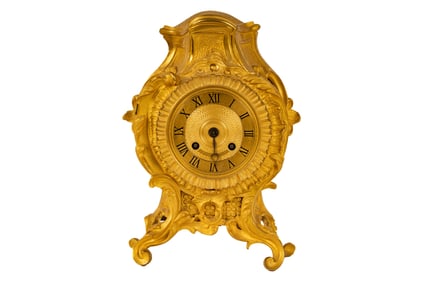 A French Rococo-Style Gilt Bronze Mantel Clock