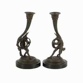 A Pair of Figural Candlesticks
