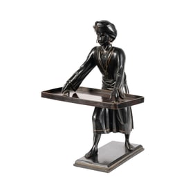 An Ebonized and Gilt Wood Figural Card Holder