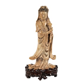 A Chinese Carved Stone Figure of Guan Yin
