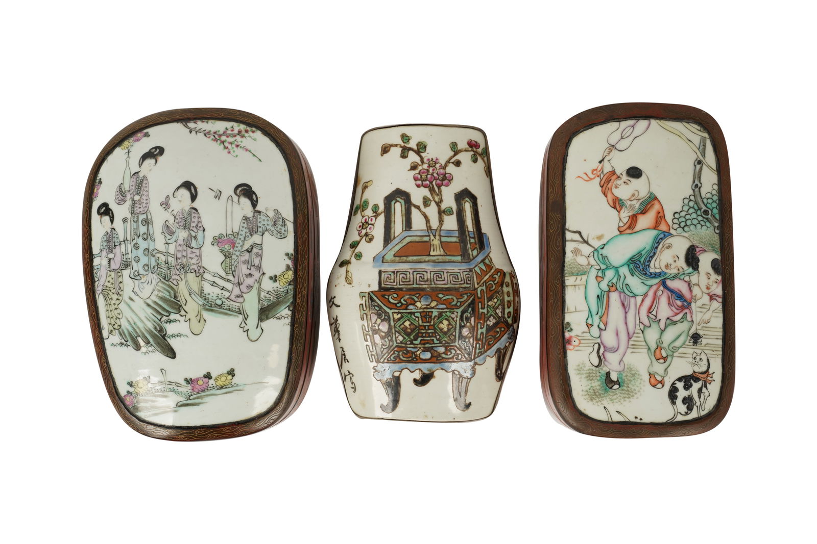 Three Chinese Porcelain Fragment Boxes: three antique porcelain fragments, incorporated into decorative boxes; two mounted in lacquered wood (Largest: 4 1/2 x 9 x 6 in.), one mounted in metal (4 x 8 x 5 1/2 in.)