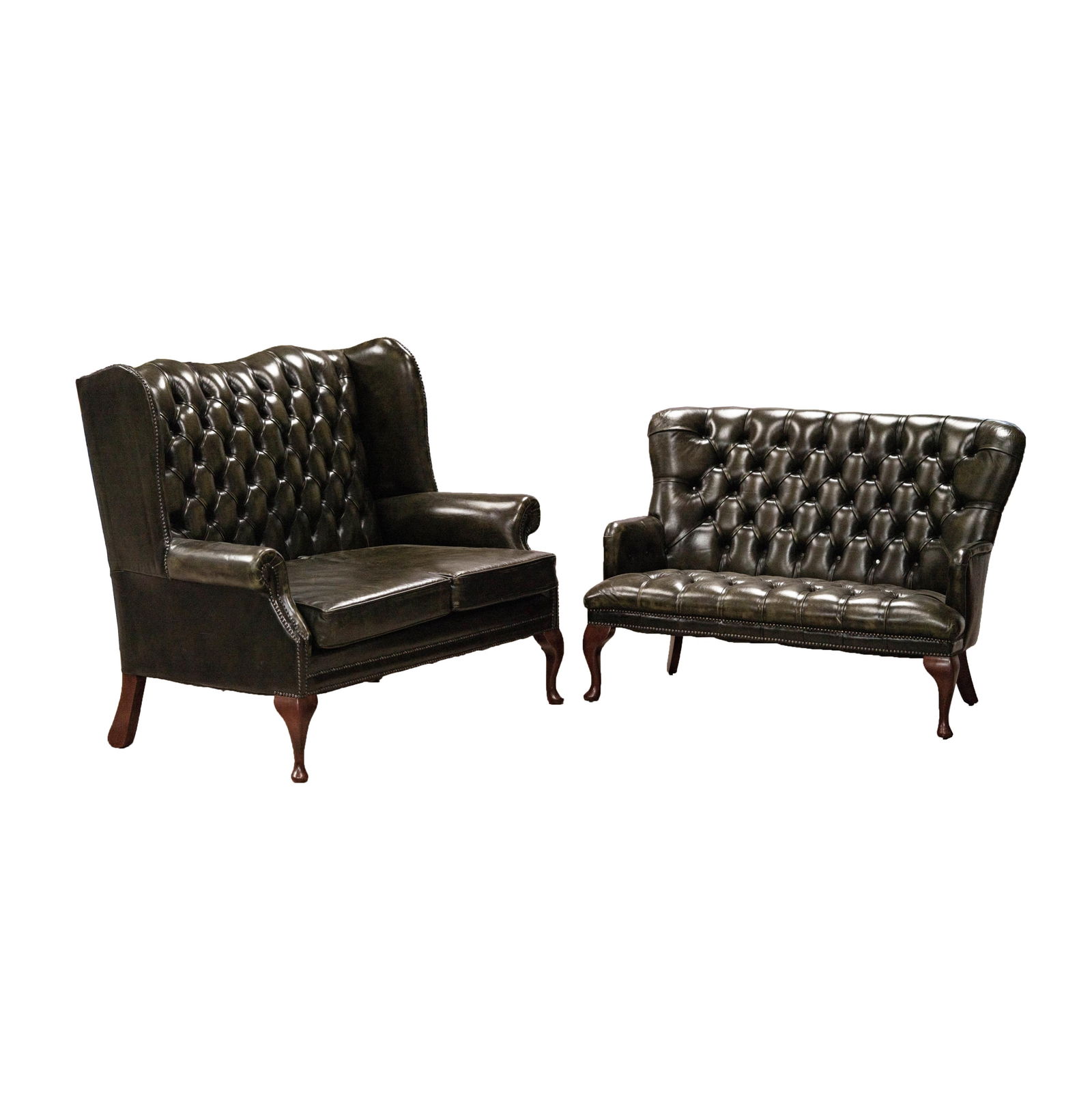 Two Green Leather Loveseats: each: 20/21st One: 45 x 25 x 33 in. (114.3 x 63.5 x 83.8 cm.), The other: 40 1/2 x 53 x 30 in. (102.9 x 134.6 x 76.2 cm.)