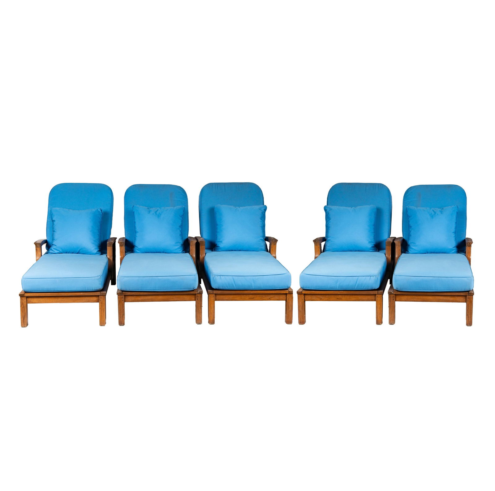 A Set of Five Gloster Furniture Co. Teak Patio Chaise Lounges: with removable blue fabric cushions Fully upright: 42 x 32 x 65 in. (106.7 x 81.3 x 165.1 cm.), Seat height: 17 in. (43.2 cm.)
