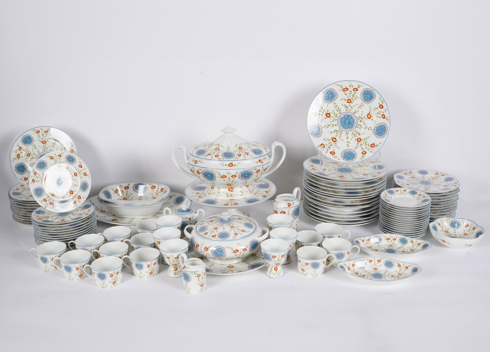 A Raynaud Limoges Ceralene Porcelain Service: "Sarabande" pattern; comprising 13 cups (2 1/4 in. high), 16 saucers (6 in. dia.), 12 plates (7 1/2 in. dia.), 12 octagonal salad plates (8 3/4 in. dia.), 12 plates (9 in. dia.), 16 plates (10 3/4 in.