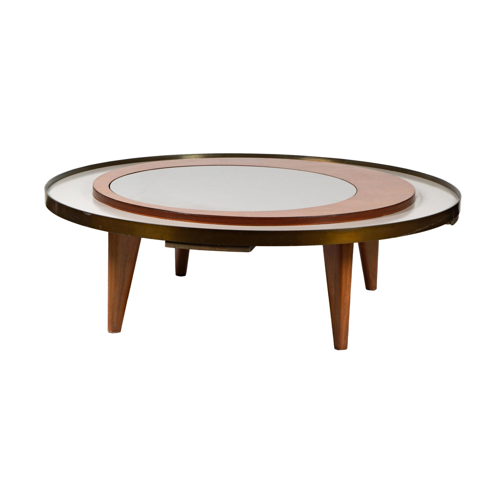 William Wurster (1895-1973): Circular Coffee Table: c. 1955; teak, brass, laminate; unsigned 19 1/4 x 60 1/2 in. (48.9 x 153.7 cm.) Provenance: from Sea Cliff House, CA