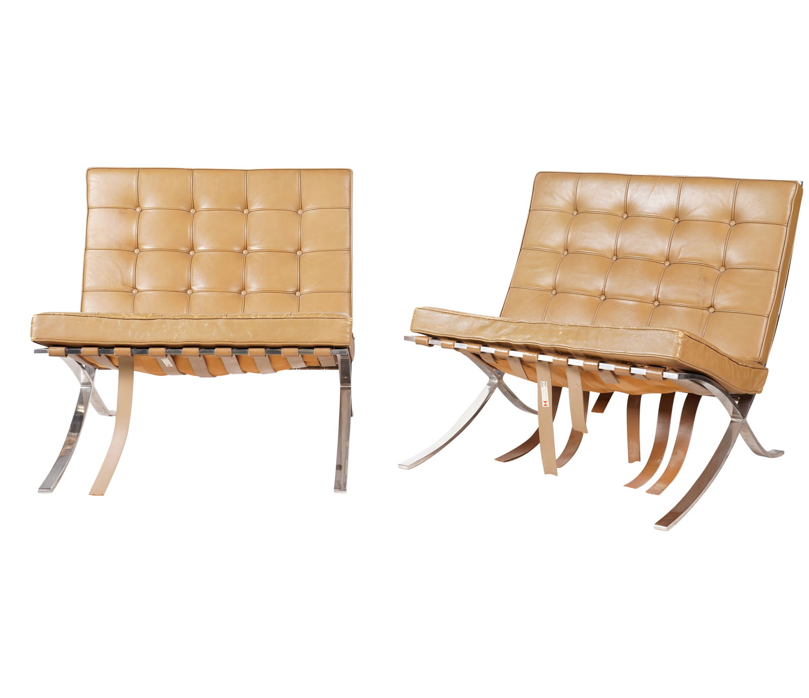 Mies van der Rohe for Knoll: Pair of Barcelona Chairs: USA, 1961-1970; steel, leather; with label "Knoll Associates In.c, 320 Park Avenue N.Y." 29 1/4 x 29 1/4 x 29 3/4 in. (74.3 x 74.3 x 75.6 cm.)