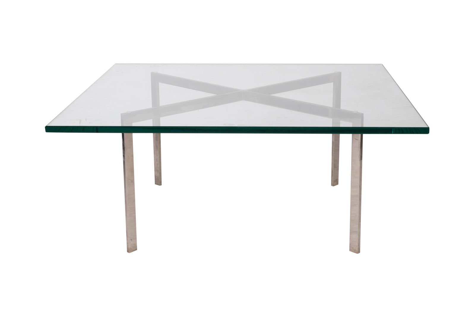 Mies Van Der Rohe for Knoll: Barcelona Table: glass, stainless steel; unsigned 16 1/2 x 40 x 40 in. (41.9 x 101.6 x 101.6 cm.)