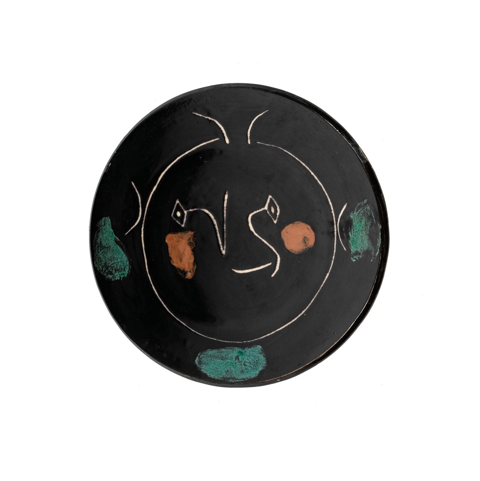 Pablo Picasso (1881-1973): Plate from Service visage noir: Pablo Picasso Spanish 1881-1973 Plate from Service visage noir (A.R. 37) white earthenware plate, partially engraved, with colored engobe and glaze conceived in 1948; executed in an edition of 100; ex