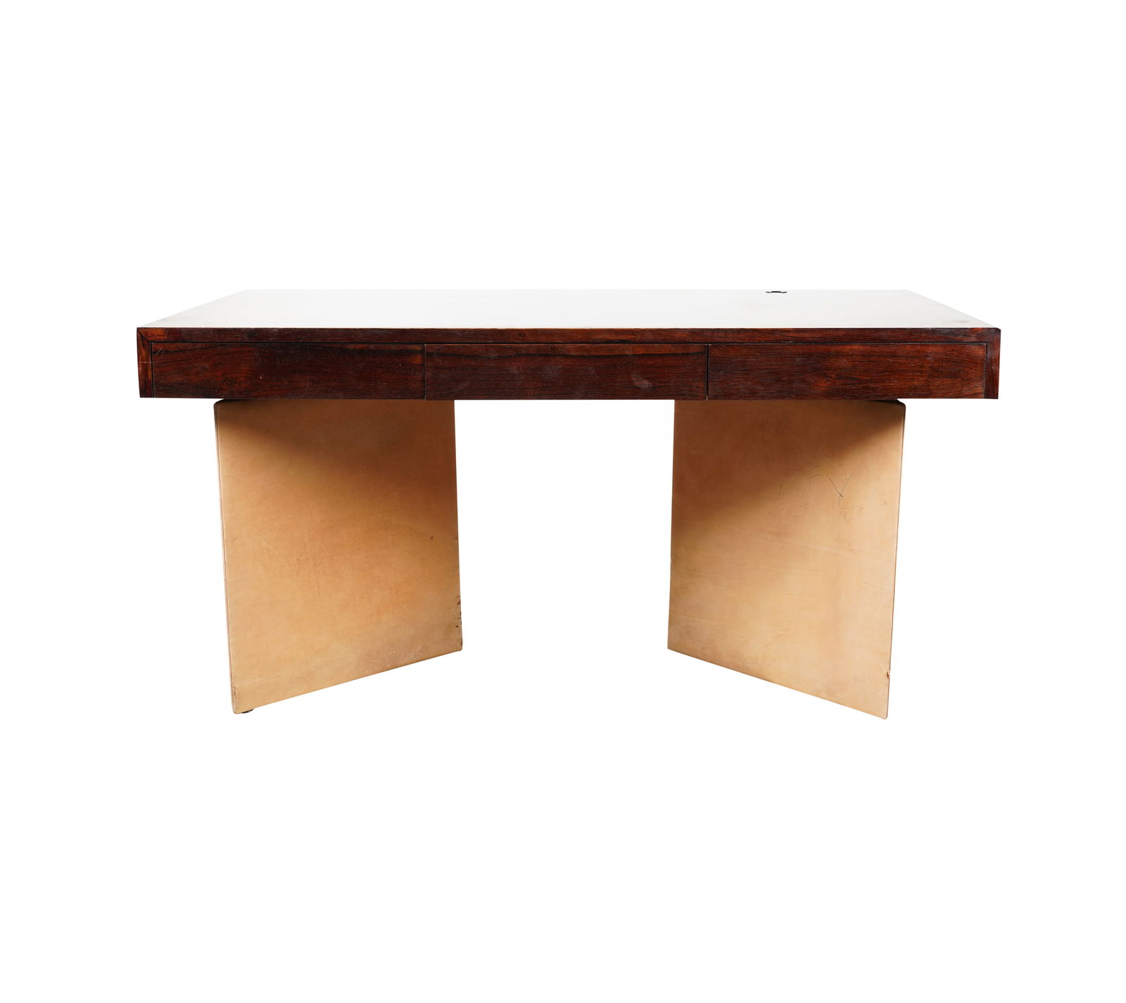 A Pace Executive Desk: rosewood and suede; the rectangular top over three drawers, on two triangular pedestals; unsigned 29 1/2 x 60 x 34 in. (74.9 x 152.4 x 86.4 cm.) Provenance: Property from an Estate, Newport Beach, CA