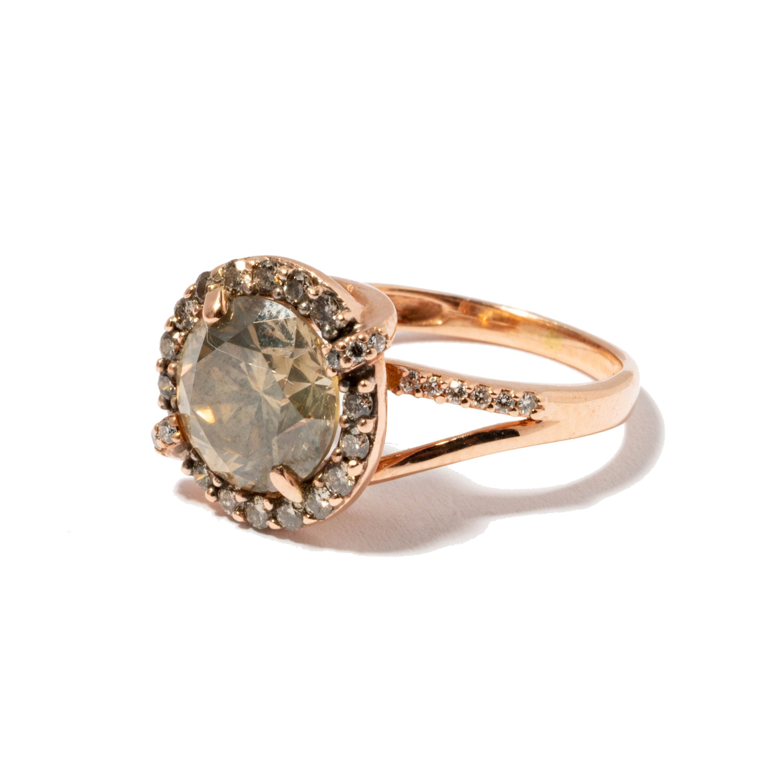 14 Karat Rose Gold and Colored Diamond Ring: centering one round brilliant cut diamond [Fancy Light Brown/VS2-SI1] weighing approximately 2.45 carats, 16 full-cut diamonds [Light Brown/SI1] weighing approximately .25 carats total, and 12 full-cu