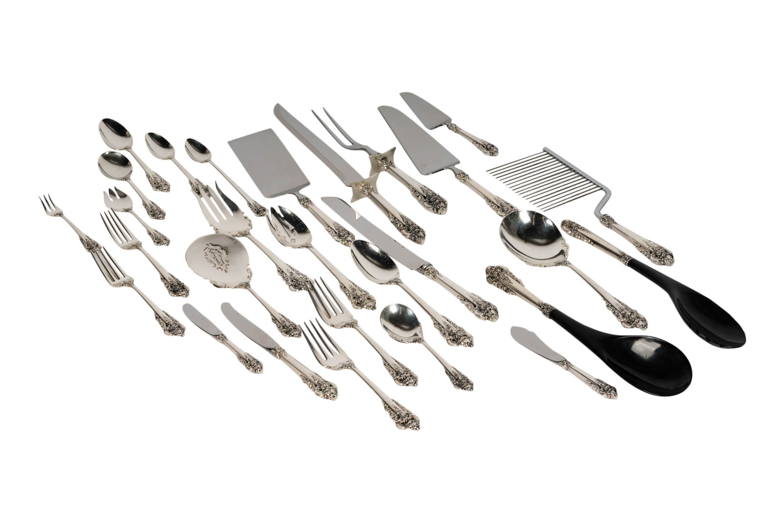 A Wallace Grande Baroque Sterling Flatware Service for Twelve: Wallingford, CT; comprising twelve stainless-bladed dinner knives, twelve dinner forks, twelve salad forks, 12 tablespoons, 17 teaspoons, 12 soup spoons, 12 butter spreaders, 12 seafood forks, 12 iced