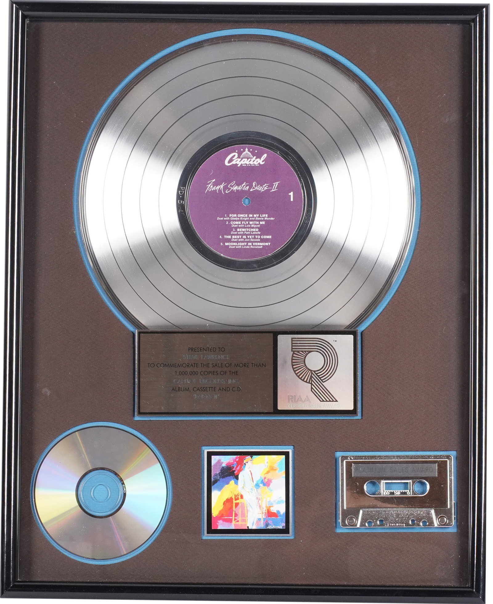 Collection of Eydie Gorme and Steve Lawrence: Platinum Record for Frank Sinatra's Duets II: the framed display comprising the platinum disc, a plaque inscribed "Presented t Steve Lawrence to commemorate the sale of more than 1,000,000 copies of the Capitol Records Inc. album, cassette and CD