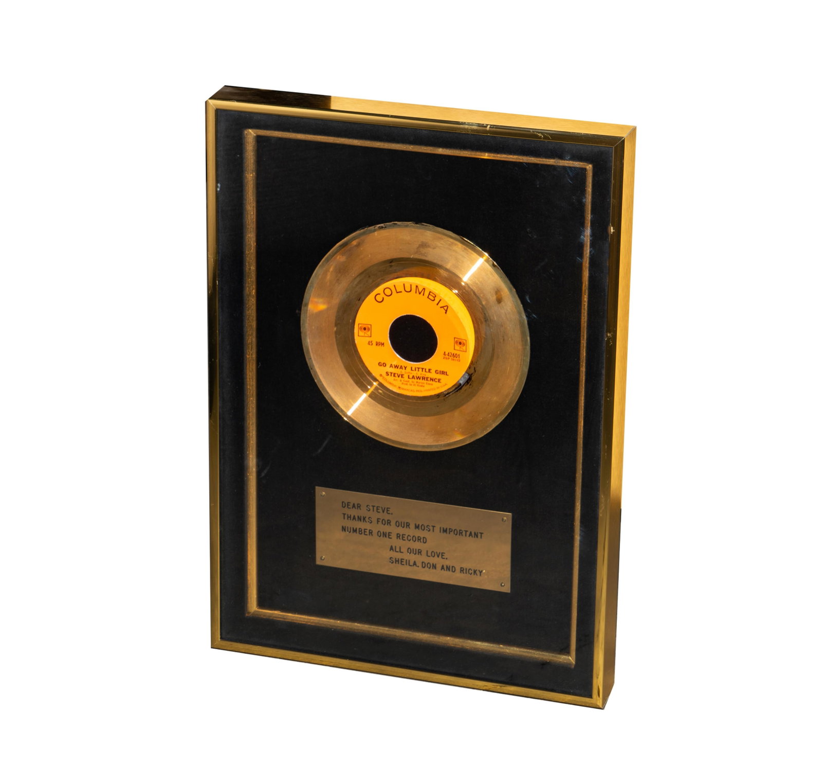 Collection of Eydie Gorme and Steve Lawrence: Go Away Little Girl Gold Record: the presentation plaque inscribed "Dear Steve / Thanks for our most important number one record / All our love, Sheila, Don and Ricky". Frame: 17 x 12 in. (43.2 x 30.5 cm.) Provenance: The Estate of A
