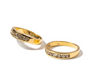 Two 18 Karat Yellow Gold Diamond Bands