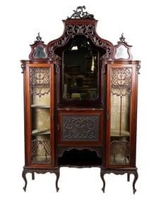 A Carved Mahogany Vitrine Cabinet