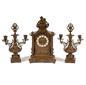 A French Orientalist-Style Bronze Three-Piece Clock Garniture