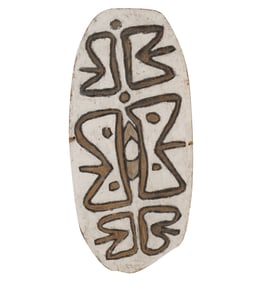 A Carved and Painted Wood Tribal Shield