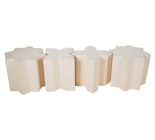 A Set of Four White-Painted Raffia-Clad Taborets