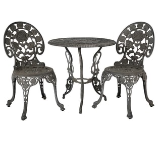 A Cast Metal Patio Table and Two Chairs