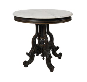 A Victorian Marble-Top Carved Walnut Oval Parlor Table