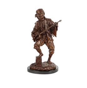 A Patinated Bronze Figure of an Erhu Player