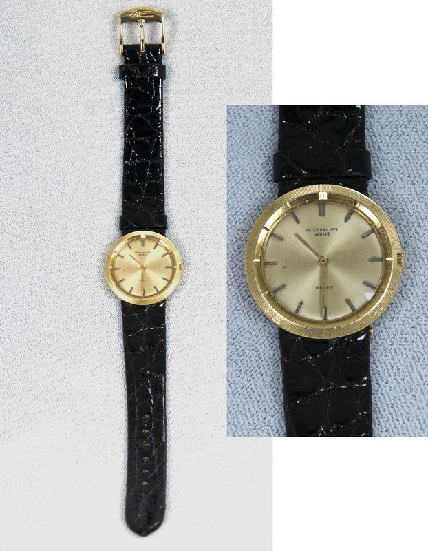 PATEK PHILIPPE EIGHTEEN KARAT GENTLEMAN'S WATCH: PATEK PHILIPPE VINTAGE EIGHTEEN KARAT GENTLEMAN'S WRISTWATCH Circa 1948; yellow gold with black strap; reference 4357; movement 857872