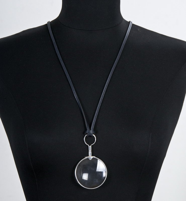 HERMES STERLING MAGNIFYING GLASS: On a leather cord