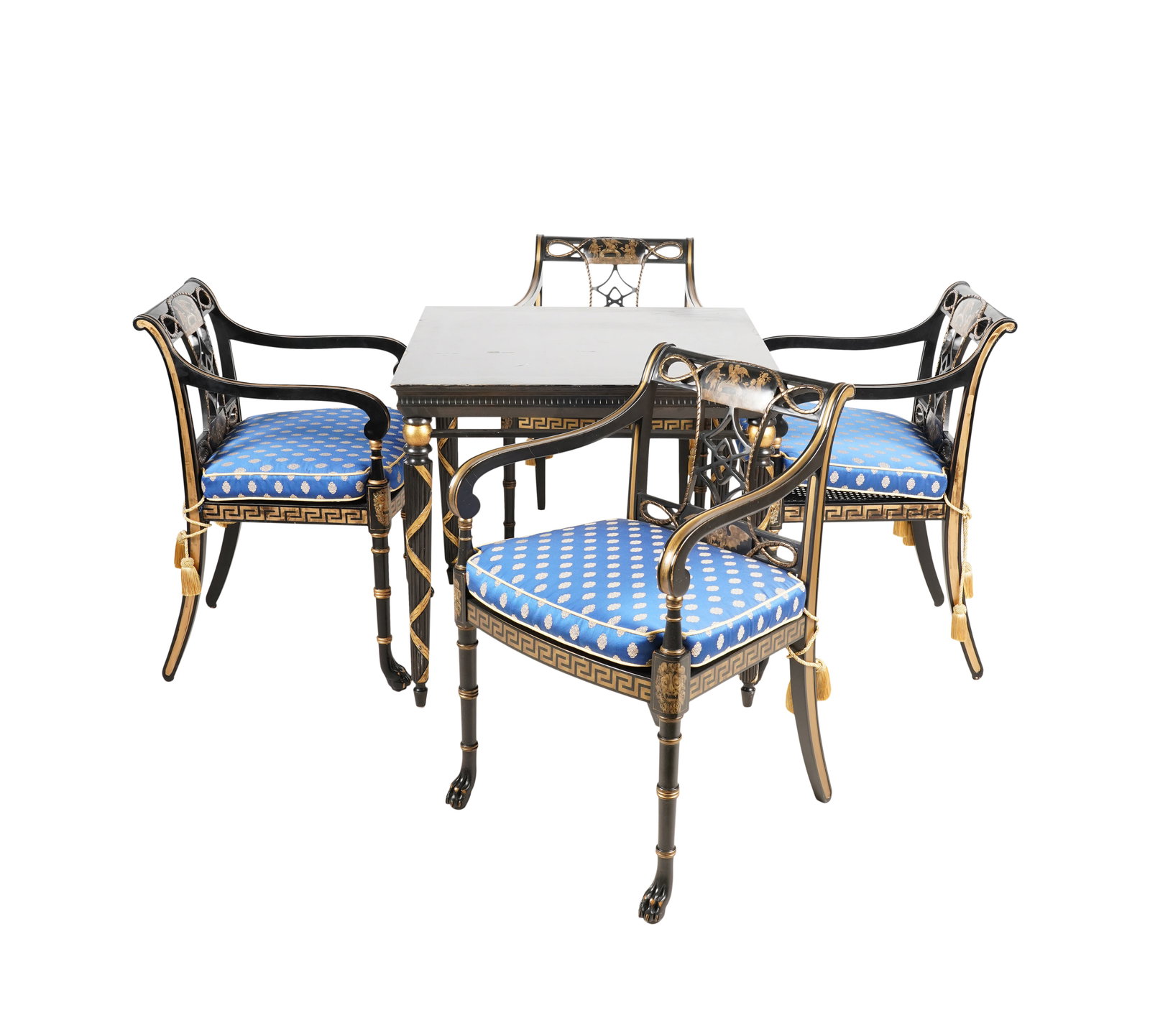 A Regency-Style Black-Lacquered and Gilt Table and Four Chairs: each chair with loose seat cushion in blue and gold fabric; two chairs with manufacturer's label "Interior Crafts / Chicago", two chairs and the table unsigned Table: 29 x 32 x 32 in. (73.7 x 81.3 x 8
