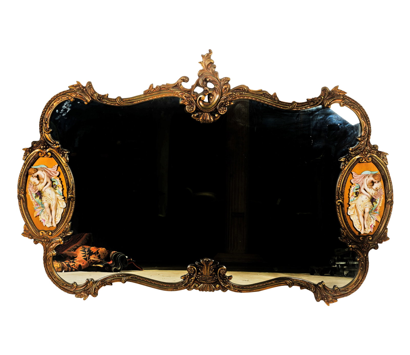 A Rococo-Style Porcelain-Mounted Giltwood Wall Mirror: first half 20th century 48 x 72 in. (121.9 x 182.9 cm.)