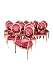 A Set of 12 Louis XVI-Style Dining Chairs