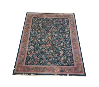 A Blue-Ground Floral Rug