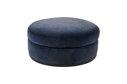 An Upholstered Round Ottoman